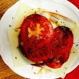 Little tomato, little Mozzarella , lots of espresso balsamic from Carmine and Lucia's